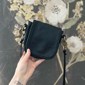 small and simple vintage black leather purse